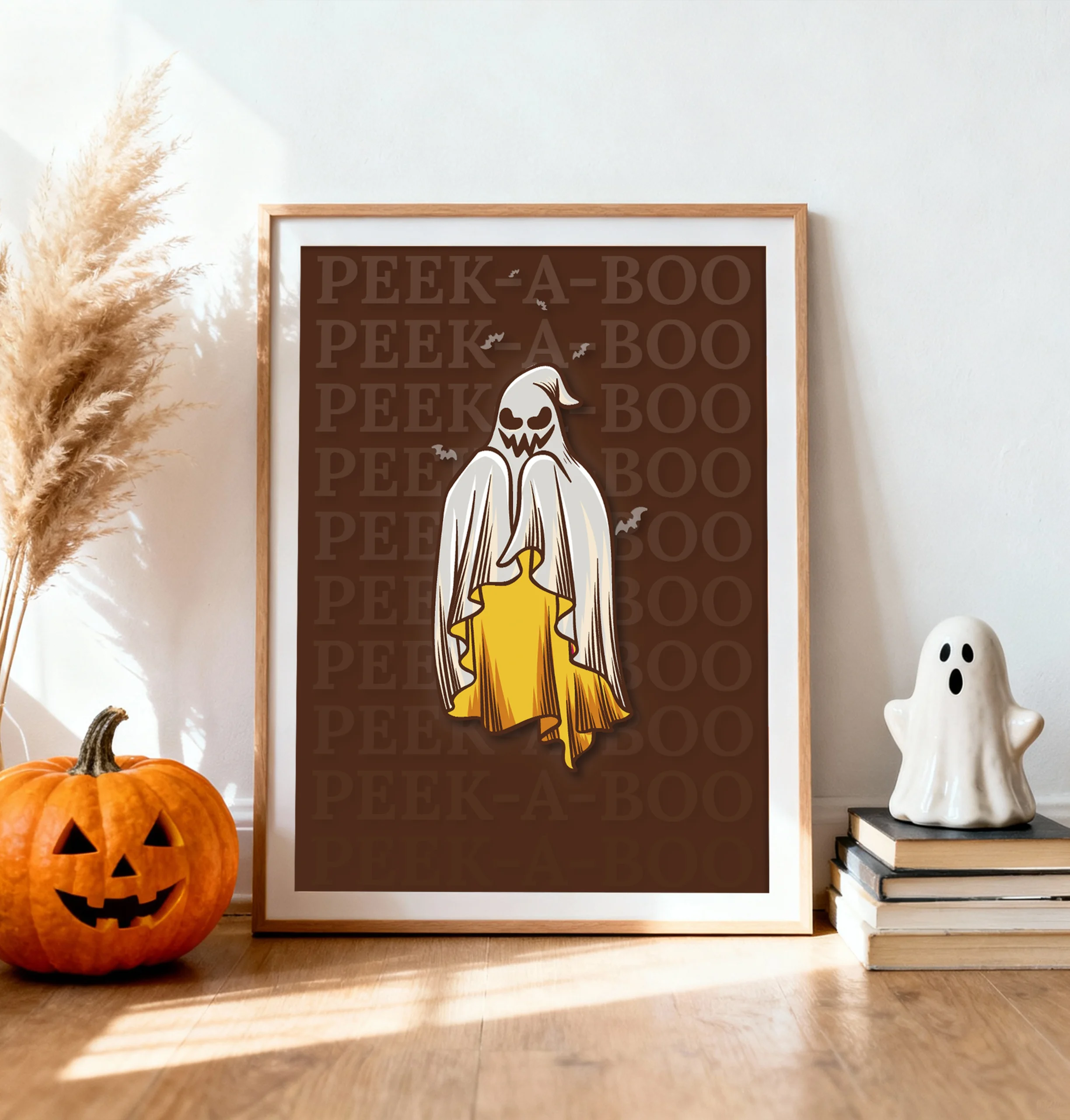 Cute ghost “Peek-A-Boo” Halloween printable poster displayed with pumpkin and ceramic ghost, cozy seasonal home setup